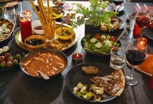 Brunch table setting with tasty delicious food and beverages ready for holiday home dinner